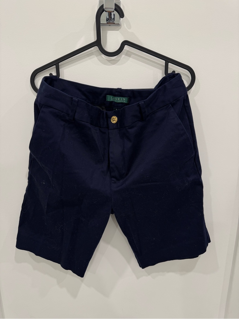 Ralph Lauren women’s Classic Navy Cotton Chino Shorts with gold button. Size 8